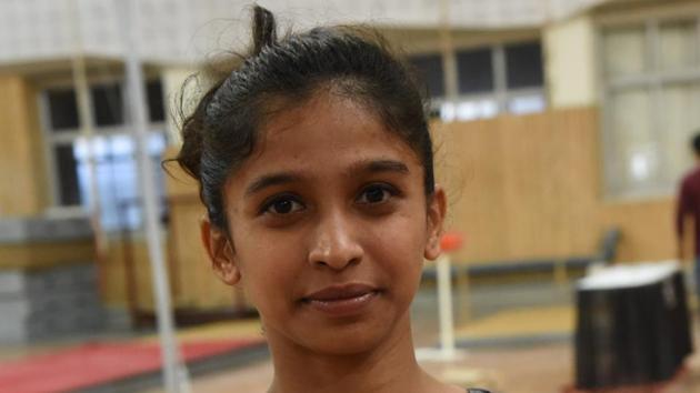 Shraddha Talekar in action at 55th junior artistic gymnastics national championship, which concluded at Shiv Chhatrapati sports complex, gymnasium hall, Balewadi on Sunday.(HT PHOTO)