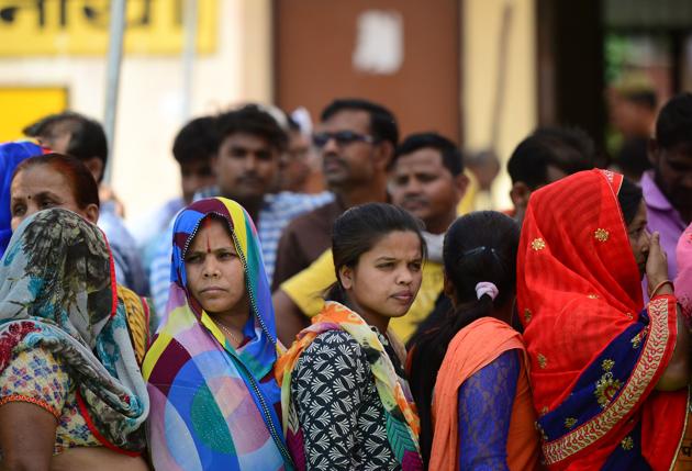 Indian voters queue at a polling station to cast their ballots during the fifth phase of general election in Amethi in Uttar Pradesh state on May 6, 2019. Image for representation (AFP file photo) Indian voters queue at a polling station to cast their ballots during the fifth phase of general election in Amethi in Uttar Pradesh state on May 6, 2019. Image for representation (AFP file photo)