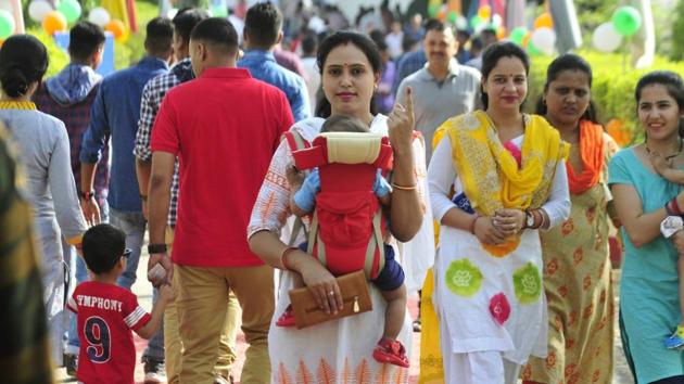 A woman shows her finger marked with indelible ink after casting vote. Voters in Lucknow alleged that some of the names were deleted in the latest electoral roll Shia PG College polling station. (Deepak Gupta / HT Photo) A woman shows her finger marked with indelible ink after casting vote. Voters in Lucknow alleged that some of the names were deleted in the latest electoral roll Shia PG College polling station. (Deepak Gupta / HT Photo)