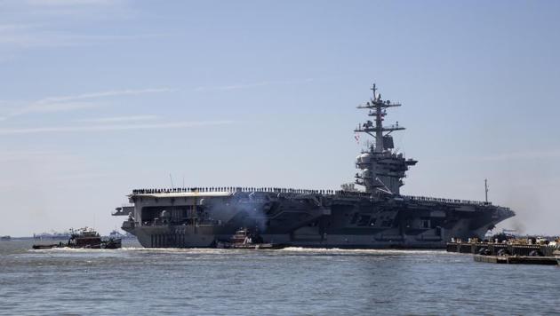 In this April 1, 2019, file photo, the USS Abraham Lincoln deploys from Naval Station Norfolk, in the vicinity of Norfolk, Va. The White House said Sunday, May 5, that the U.S. is deploying military resources to send a message to Iran. (AP) In this April 1, 2019, file photo, the USS Abraham Lincoln deploys from Naval Station Norfolk, in the vicinity of Norfolk, Va. The White House said Sunday, May 5, that the U.S. is deploying military resources to send a message to Iran. (AP)