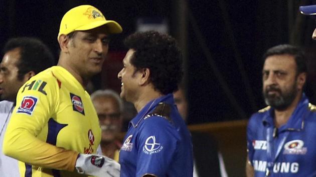 Mahendra Singh Dhoni, left, greets Sachin Tendulkar after Mumbai Indians defeated Chennai Super Kings to enter the final of the VIVO IPL T20 in Chennai, India, Tuesday, May 7, 2019.(AP)