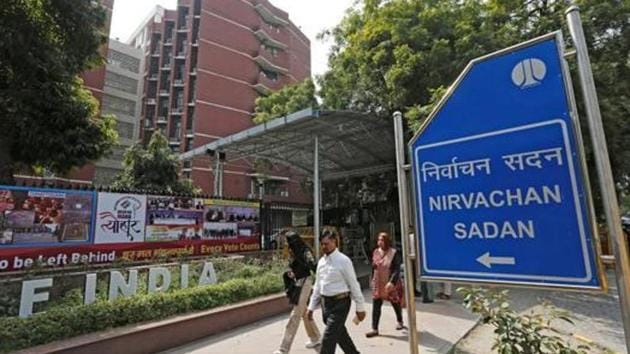 People walk past the Election Commission of India office building in New Delhi, India March 11, 2019. REUTERS/Adnan Abidi (REUTERS) People walk past the Election Commission of India office building in New Delhi, India March 11, 2019. REUTERS/Adnan Abidi (REUTERS)