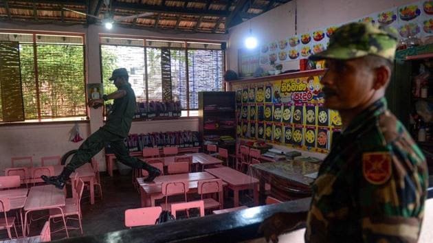 Sri Lankan soldiers inspect a school in Colombo. Security forces were on high alert after intelligence reports indicated militants could strike before the start of the Islamic holy month of Ramadan. Muslim schools will be closed for the holidays. (Ishara S Kodikara / AFP) Sri Lankan soldiers inspect a school in Colombo. Security forces were on high alert after intelligence reports indicated militants could strike before the start of the Islamic holy month of Ramadan. Muslim schools will be closed for the holidays. (Ishara S Kodikara / AFP)