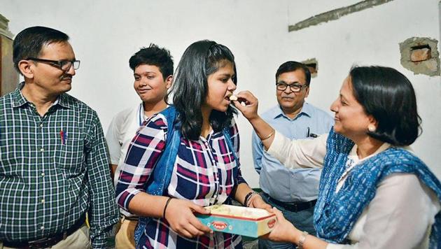 When the CBSE announced the Class 10 examination results on Monday, the Singh household in Wazirabad saw a steady stream of visitors to congratulate the family after 16-year-old Dhanjot scored 98.6%.(Biplov Bhuyan/HT PHOTO)