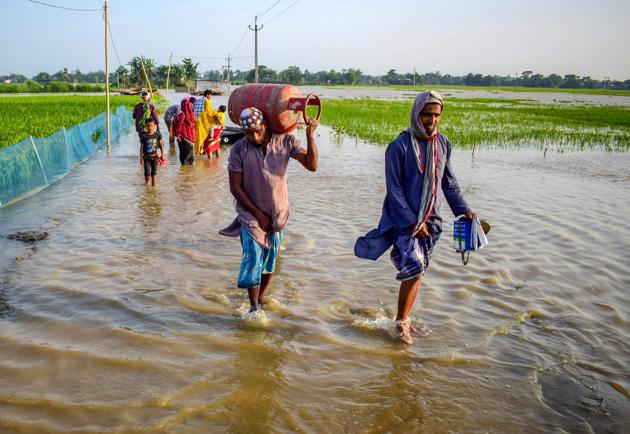 At some places, huge roots of trees are plucked out of the ground while corrugated sheets from shops and petrol pumps hang from electric wires. (PTI PHOTO) At some places, huge roots of trees are plucked out of the ground while corrugated sheets from shops and petrol pumps hang from electric wires. (PTI PHOTO)