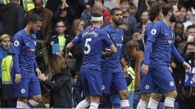 Chelsea's Ruben Loftus-Cheek, center, celebrates with teammates after scoring his side's first goal during the English Premier League soccer match between Chelsea and Watford at Stamford Bridge stadium in London, Sunday, May 5, 2019. (AP Photo/Matt Dunham)(AP)