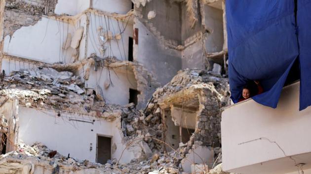 “It was a shock for us to hear it was destroyed. There’s no way we can rebuild. We can barely manage our daily expenses,” Karim said. Rubble covers three sides of the crossroads where his house stood, with bits of buildings sill protruding, in one place, an olive tree. Pigeons kept by a neighbour flutter about. (Omar Sanadiki / REUTERS) “It was a shock for us to hear it was destroyed. There’s no way we can rebuild. We can barely manage our daily expenses,” Karim said. Rubble covers three sides of the crossroads where his house stood, with bits of buildings sill protruding, in one place, an olive tree. Pigeons kept by a neighbour flutter about. (Omar Sanadiki / REUTERS)