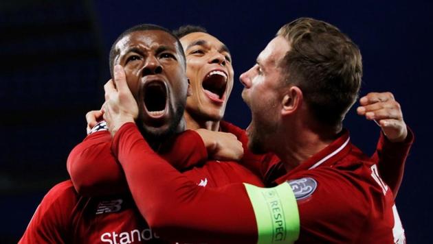 Liverpool's Georginio Wijnaldum celebrates scoring their third goal with Jordan Henderson and Trent Alexander-Arnold(REUTERS)