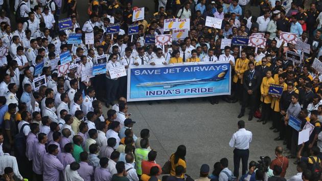 Jet Airways employees listen to a speaker during a protest demanding to “save Jet Airways” at the Chhatrapati Shivaji Maharaj International Airport in Mumbai. On Wednesday, the Bhartiya Kamgar Sena, the trade union wing of the Shiv Sena, led a protest by the staff of Jet Airways, seeking the government’s intervention to solve the crisis facing the beleaguered airline. (Francis Mascarenhas / REUTERS) Jet Airways employees listen to a speaker during a protest demanding to “save Jet Airways” at the Chhatrapati Shivaji Maharaj International Airport in Mumbai. On Wednesday, the Bhartiya Kamgar Sena, the trade union wing of the Shiv Sena, led a protest by the staff of Jet Airways, seeking the government’s intervention to solve the crisis facing the beleaguered airline. (Francis Mascarenhas / REUTERS)