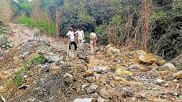 Debris dumped at a site located 500 metres from Bhakti Park monorail station in Wadala.(HT)