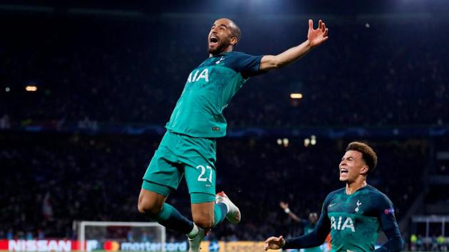 Tottenham's Lucas Moura celebrates scoring their third goal to complete his hat-trick with Dele Alli(Action Images via Reuters)