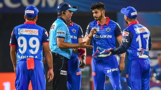 Visakhapatnam: Field Umpire Sundaram Ravi talks with DC skipper Shreyas Iyer after a collision between SRH batsman Deepak Hooda and DC bowler Keemo Paul. (PTI)