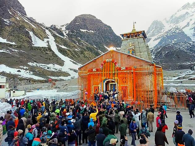 Pilgrims arrive to offer prayers as the portals of Kedarnath temple were reopened today after the six-month winter break. Uttarakhand Governor Baby Rani Maurya and former chief minister Ramesh Pokhriyal Nishank, were among thousands of pilgrims who thronged the temple on the opening day to offer prayers to the presiding deity Lord Shiva. (PTI) Pilgrims arrive to offer prayers as the portals of Kedarnath temple were reopened today after the six-month winter break. Uttarakhand Governor Baby Rani Maurya and former chief minister Ramesh Pokhriyal Nishank, were among thousands of pilgrims who thronged the temple on the opening day to offer prayers to the presiding deity Lord Shiva. (PTI)
