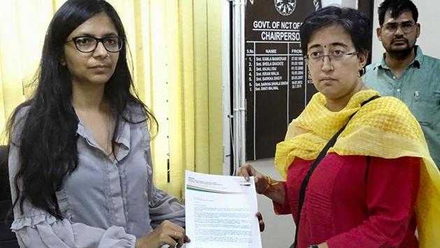 Aam Aadmi Party (AAP) party’s candidate Atishi Marlena files a complaint with Delhi Commission for Women chairperson Swati Maliwal over a derogatory pamphlet mainly targeting her, at her office in New Delhi. (PTI) Aam Aadmi Party (AAP) party’s candidate Atishi Marlena files a complaint with Delhi Commission for Women chairperson Swati Maliwal over a derogatory pamphlet mainly targeting her, at her office in New Delhi. (PTI)