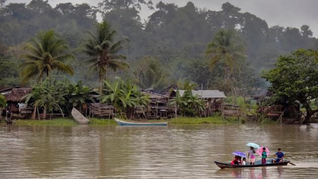 The local communities had to negotiate with several armed groups to ensure safe passage for the San Raffaele. Gunmen have held sway here for decades -- from National Liberation Army rebels to narco-trafficking gangs like the feared Gulf Clan -- effectively making it a war zone. “Sometimes it has been difficult to reach the villages where there have been clashes, bombs,” said Lopez. (Raul Arboleda  / AFP) 