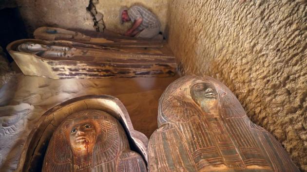 An Egyptian archaeologist works on the sarcophagi at the newly discovered burial site, the Tomb of Behnui-Ka and Nwi, dating back to circa 2500 B.C. near the Great Pyramids in Giza, on the outskirts of Cairo, Egypt. (Mohamed Abd El Ghany / REUTERS) An Egyptian archaeologist works on the sarcophagi at the newly discovered burial site, the Tomb of Behnui-Ka and Nwi, dating back to circa 2500 B.C. near the Great Pyramids in Giza, on the outskirts of Cairo, Egypt. (Mohamed Abd El Ghany / REUTERS)