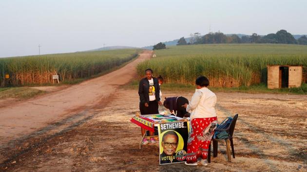 Inkatha Freedom Party agents are seen near a polling station ahead of South Africa’s parliamentary and provincial elections in the Farm lands near Eshowe, South Africa. (Rogan Ward / REUTERS) Inkatha Freedom Party agents are seen near a polling station ahead of South Africa’s parliamentary and provincial elections in the Farm lands near Eshowe, South Africa. (Rogan Ward / REUTERS)