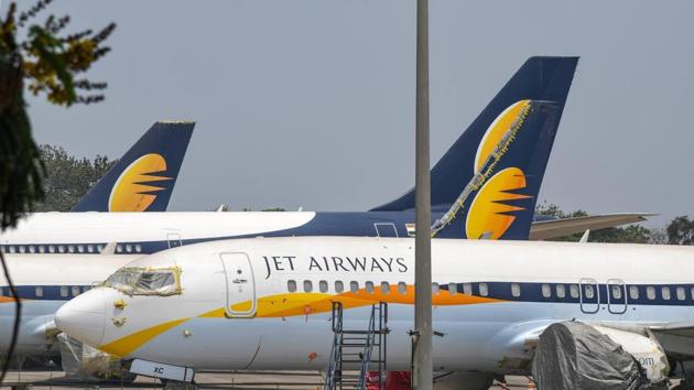 On Friday, the State Bank of India (SBI) said that it has received two unsolicited bids for ailing Jet Airways, nearly a month after the airline was forced to ground all operations due to funding troubles. Jet, once India’s largest private airline, stopped all flights on April 17 after its lenders, led by SBI, declined to extend more funds to keep the carrier going. (Shirish Shete / PTI File) On Friday, the State Bank of India (SBI) said that it has received two unsolicited bids for ailing Jet Airways, nearly a month after the airline was forced to ground all operations due to funding troubles. Jet, once India’s largest private airline, stopped all flights on April 17 after its lenders, led by SBI, declined to extend more funds to keep the carrier going. (Shirish Shete / PTI File)