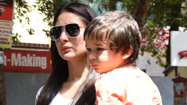 Mumbai: Actress Kareena Kapoor Khan arrives with son, Taimur, to cast her vote at a polling booth in Mumbai on April 29, 2019. (Photo: IANS)(IANS)