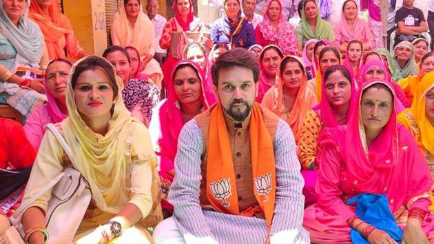 BJP sitting MP and candidate from Himachal Pradesh’s Hamirpur Anurag Thakur during his election campaign in constituency.(HT file photo)
