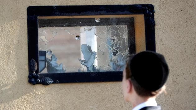 A boy looks at a damaged house after it was hit by a rocket, fired from Gaza over the border, to the Israeli side in Kiryat Gat, Israel. (Ronen Zvulun / REUTERS) A boy looks at a damaged house after it was hit by a rocket, fired from Gaza over the border, to the Israeli side in Kiryat Gat, Israel. (Ronen Zvulun / REUTERS)