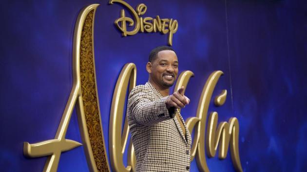 Actor Will Smith poses for photographers upon arrival at the Aladdin European Gala premiere in London.(Joel C Ryan/Invision/AP)