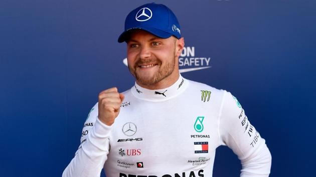 Mercedes' Finnish driver Valtteri Bottas celebrates after securing the pole position. (AFP) Mercedes' Finnish driver Valtteri Bottas celebrates after securing the pole position. (AFP)