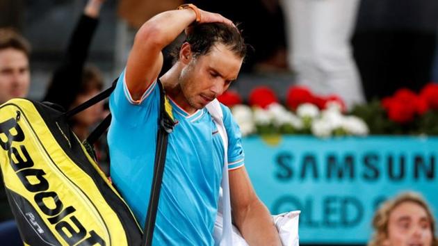 Rafael Nadal reacts after losing his semi final match against Greece's Stefanos Tsitsipas in Madrid.(REUTERS)