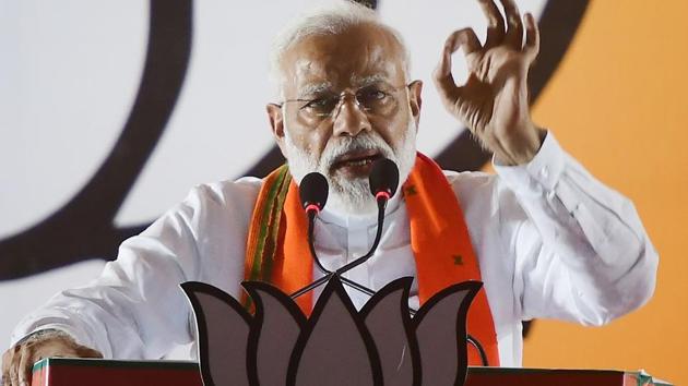 PM Modi said that Madhya Pradesh governance is handled by ‘two and half CMs’ while addressing a rally in Khandwa, MP.(AFP file photo)