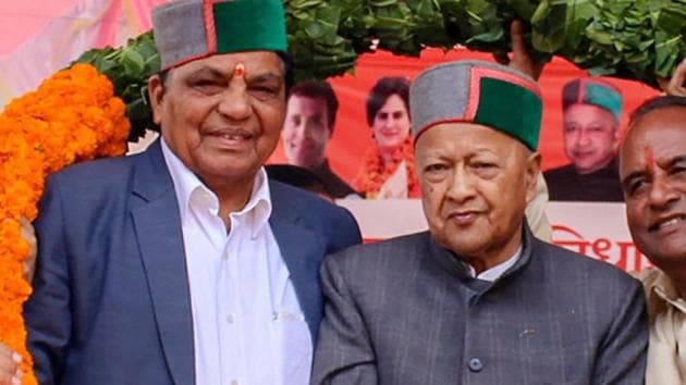 Former Himachal Pradesh chief minister and senior Congress leader Virbhadra Singh with party's Shimla candidate Dhani Ram Shandil (left) at an election rally, in Sirmaur, Saturday, April 20, 2019.(PTI File)