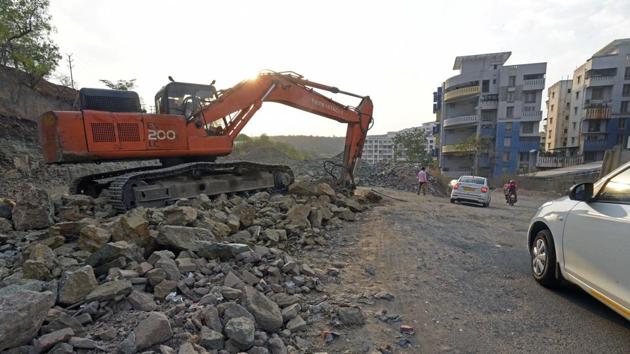 What bothers the local residents most is that Dukkar Khind hill is part of the bio diversity park area in the city.(Pratham Gokhale/HT Photo)