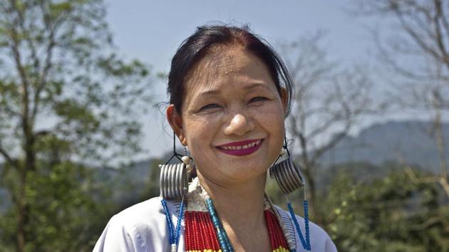 An Adi tribal woman Kinya Bagra, 33, poses for a photograph in Along, Arunachal Pradesh. Bagra said she voted for the development of her village. She hopes the newly elected leader will provide free education for women. (Anupam Nath / AP) An Adi tribal woman Kinya Bagra, 33, poses for a photograph in Along, Arunachal Pradesh. Bagra said she voted for the development of her village. She hopes the newly elected leader will provide free education for women. (Anupam Nath / AP)