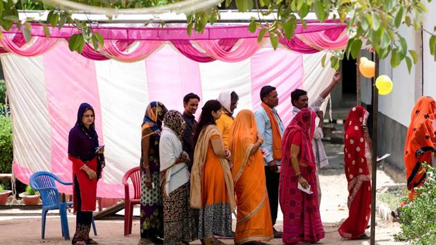 Voters queue at a polling station to cast their votes at Rampur Village in Allahabad, Uttar Pradesh on May 12, 2019, for the sixth phase of Lok Sabha elections. (AFP) Voters queue at a polling station to cast their votes at Rampur Village in Allahabad, Uttar Pradesh on May 12, 2019, for the sixth phase of Lok Sabha elections. (AFP)