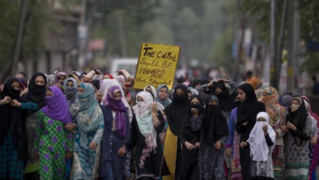 Kashmiri women protest against the alleged rape of a three-year-old girl from north Kashmir at Mirgund, on the outskirts of Srinagar on Monday.(AP)