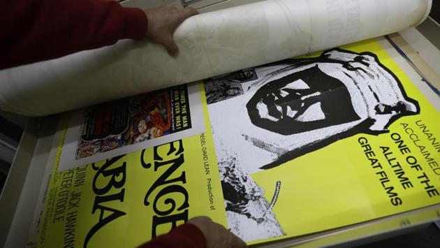 Abu Jawdeh shows part of his vintage cinema poster collection at his office. He first began collecting posters in his teens, starting with films starring American actors Steve McQueen and Clint Eastwood. Visiting old cinemas in Lebanon and across the region, he unearthed a world of images -- for more foreign films, but also thousands of prints advertising films from the Arab world. (Joseph Eid / AFP) Abu Jawdeh shows part of his vintage cinema poster collection at his office. He first began collecting posters in his teens, starting with films starring American actors Steve McQueen and Clint Eastwood. Visiting old cinemas in Lebanon and across the region, he unearthed a world of images -- for more foreign films, but also thousands of prints advertising films from the Arab world. (Joseph Eid / AFP)
