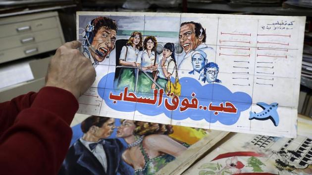 Some of his finds in this rare collection date back to 1930s Egypt or Lebanon in the late 1950s. Today he owns some 20,000 posters, stacked up to the ceiling at his publishing house, their bright colours shielded from the sunlight. Different versions of the same poster are especially revealing -- indicating which country required a change in a film title or a bra to be painted over a naked back to avoid offence. (Joseph Eid / AFP) Some of his finds in this rare collection date back to 1930s Egypt or Lebanon in the late 1950s. Today he owns some 20,000 posters, stacked up to the ceiling at his publishing house, their bright colours shielded from the sunlight. Different versions of the same poster are especially revealing -- indicating which country required a change in a film title or a bra to be painted over a naked back to avoid offence. (Joseph Eid / AFP)
