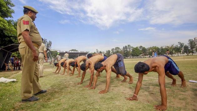 Candidates during a physical fitness test for the post of Special Police Officers at Gulshan Ground in Jammu. (PTI) Candidates during a physical fitness test for the post of Special Police Officers at Gulshan Ground in Jammu. (PTI)