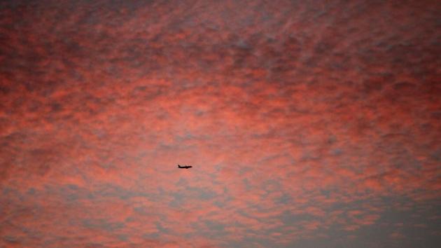 Mumbai, India - May 9, 2019:An Aircraft pass through tinted clouds at Juhu in Mumbai, India, on Thursday, May 9, 2019. (Photo by Ragul Krishnan/ HT PHOTO) (Ragul Krishnan / HT Photo) Mumbai, India - May 9, 2019:An Aircraft pass through tinted clouds at Juhu in Mumbai, India, on Thursday, May 9, 2019. (Photo by Ragul Krishnan/ HT PHOTO) (Ragul Krishnan / HT Photo)