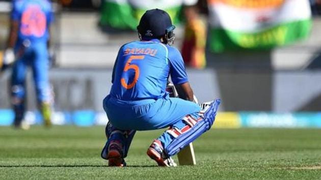 India's Ambati Rayudu (C) reacts as teammate Vijay Shankar (back L) walks from the pitch.(AFP)