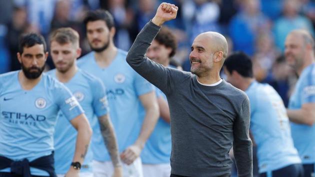 Manchester City manager Pep Guardiola celebrates winning the Premier League.(Action Images via Reuters)