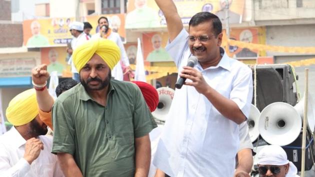 Delhi chief minister Arvind Kejriwal with AAP candidate Bhagwant Mann during a road show in Sangrur, Punjab, on Monday, May 13, 2019. (HT Photo) (HT Photo) Delhi chief minister Arvind Kejriwal with AAP candidate Bhagwant Mann during a road show in Sangrur, Punjab, on Monday, May 13, 2019. (HT Photo) (HT Photo)