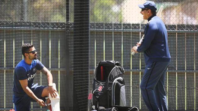 File photo of Virat Kohli talking to then India Director of Cricket Ravi Shastri who reacts during an India Training Session at Adelaide Oval on December 8, 2014 in Adelaide, Australia. Kohli was made captain after MS Dhoni retired from Test cricket. (Photo by Michael Dodge/Getty Images) (Getty Images) File photo of Virat Kohli talking to then India Director of Cricket Ravi Shastri who reacts during an India Training Session at Adelaide Oval on December 8, 2014 in Adelaide, Australia. Kohli was made captain after MS Dhoni retired from Test cricket. (Photo by Michael Dodge/Getty Images) (Getty Images)