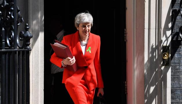 Britain's Prime Minister Theresa May has set the stage for a fourth showdown with parliament over her EU withdrawal deal next month, which could also be her last act as Britain's prime minister.(AFP)