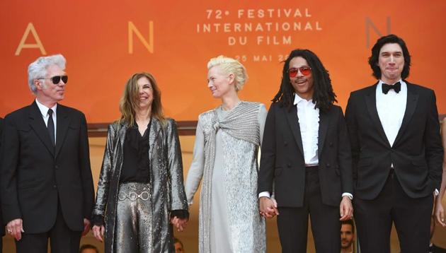 Director Jim Jarmusch and his partner, US director Sara Driver, actors Tilda Swinton, Luka Sabbat and Adam Driver arrive for the screening of The Dead Don't Die.(AFP)