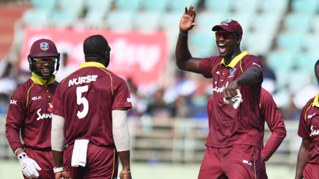 Representative image - File image of Windies cricketer Jason Holder celebrates with his teammates after a wicket.(AFP)