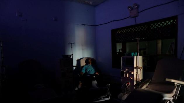 William Lopez, 45, a patient with kidney disease, waits for the electricity to return, at a dialysis centre, during a blackout in Maracaibo, Venezuela. Like any chronic kidney patient, he could die if he goes too long without treatment. “The impotence that I feel makes me want to cry,” said Lopez, 45, one of 11,000 Venezuelans whose dialysis treatment has been thrown into disarray by a wave of blackouts in the oil-rich but crisis-stricken South American country. (Ueslei Marcelino / REUTERS)