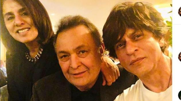 Shah Rukh Khan poses with Rishi Kapoor and Neetu Kapoor in New York.