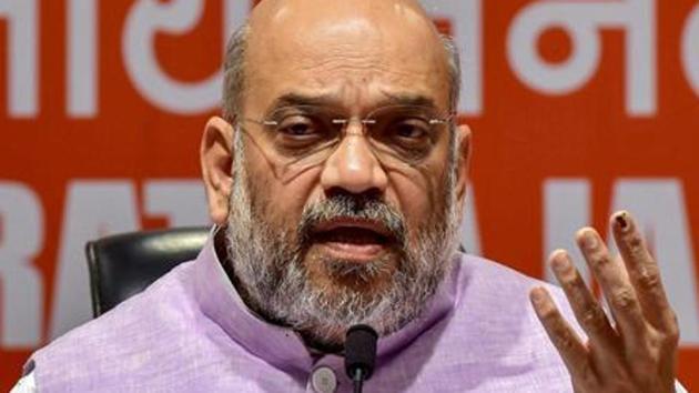 BJP national president Amit Shah holding a road show in Gorakhpur.(PTI/File Photo)