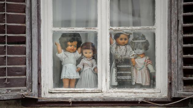 Dolls decorate a window in the old part of the Transylvanian town of Sibiu, Romania. (Vadim Ghirda / AP) Dolls decorate a window in the old part of the Transylvanian town of Sibiu, Romania. (Vadim Ghirda / AP)