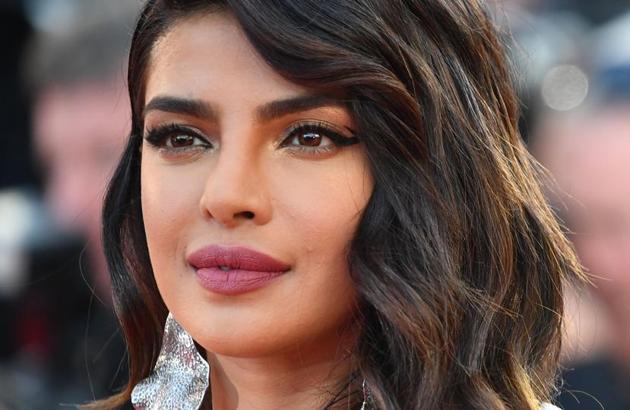 Indian actress and model Priyanka Chopra poses as she arrives for the screening of the film "Rocketman" at the 72nd edition of the Cannes Film Festival in Cannes, southern France, on May 16, 2019. (Photo by Alberto PIZZOLI / AFP)(AFP)